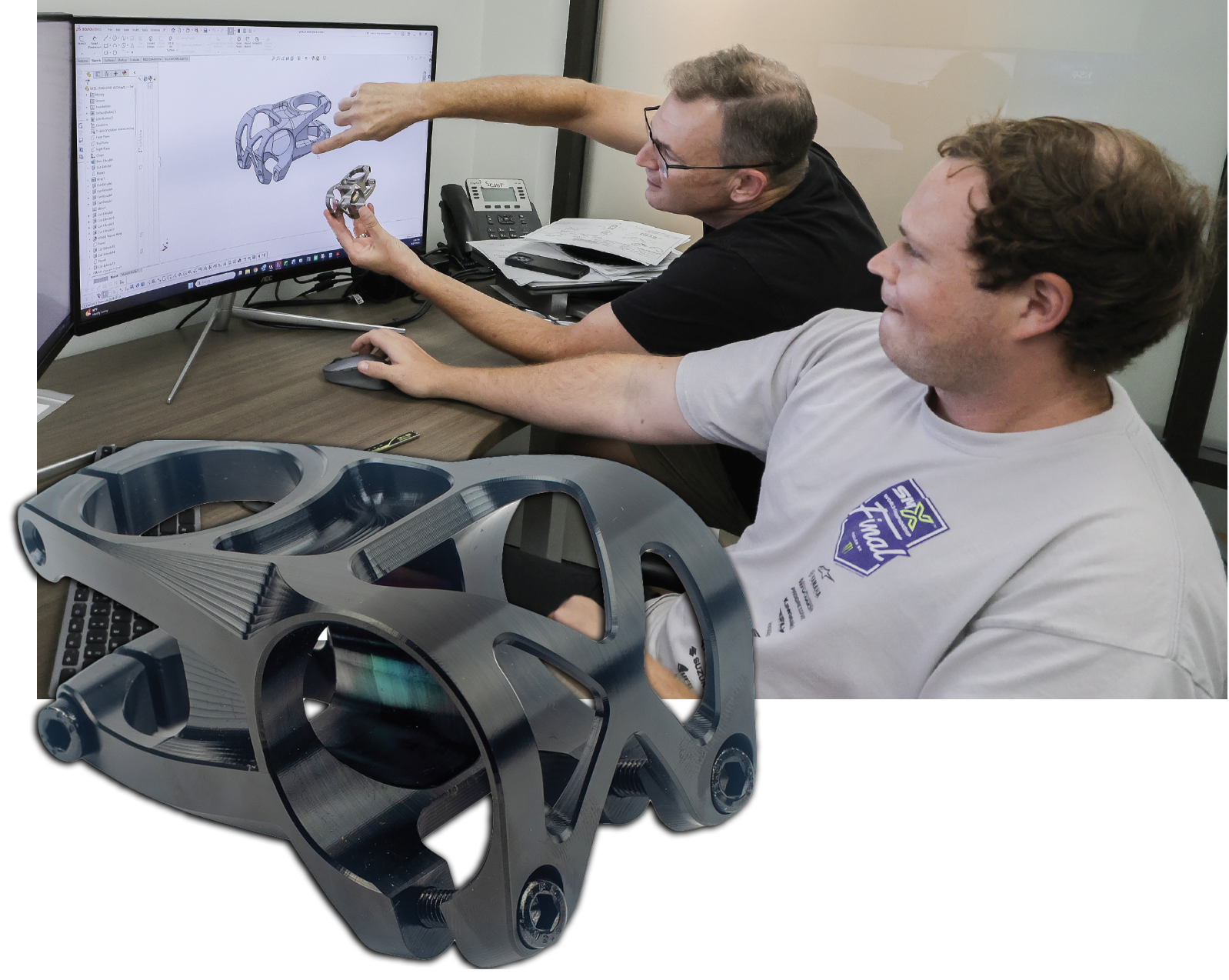 Mechanical Engineer Scout Ferguson (front) and Director of Sales James Ayres (behind) discuss the new 5DEV titanium stem.